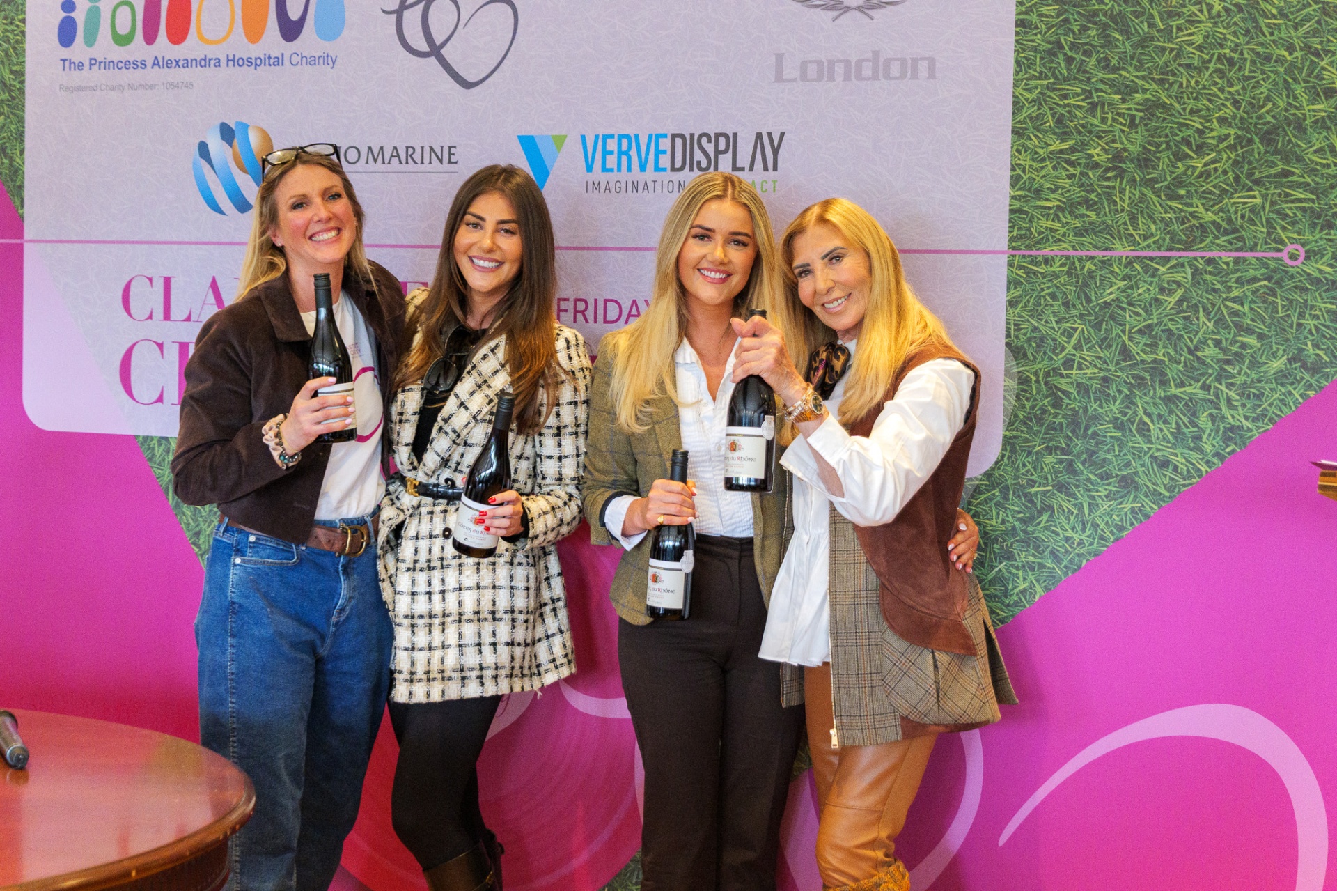 Guests by the sponsor wall